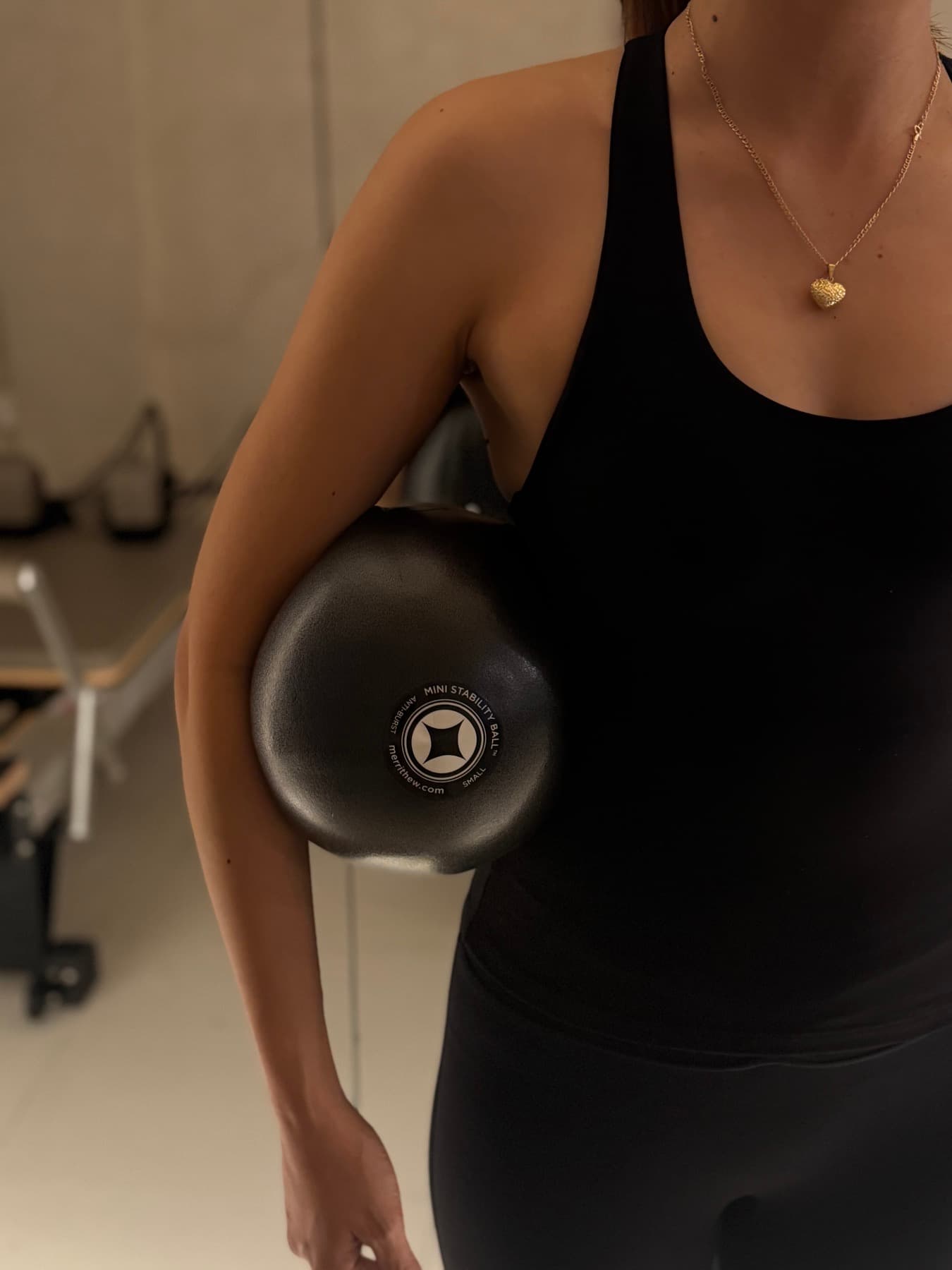 Holding a Pilates ball